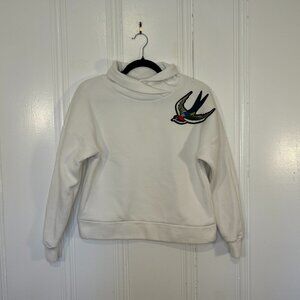 Tulip neck sweatshirt with bird applique